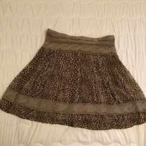 Leopard print and knit mini skirt
